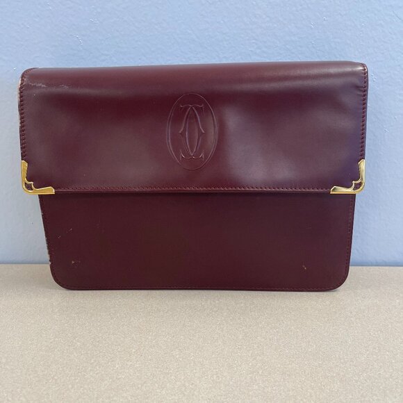 Cartier Must de Cartier Burgundy Leather Clutch w/ Retractable Strap  - Preowned - Picture 1 of 14